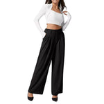 Women wearing black waffle knit straight leg pants